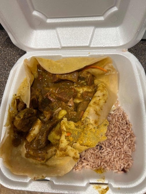 Caribbean Style Curry Goat Roti (No Sides).