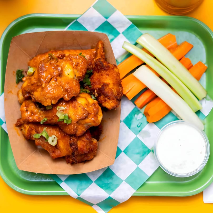 Andreas Caribbean & Seafood Restaurant's Jamaican jerk chicken wings with celery, carrots, and dipping sauce.